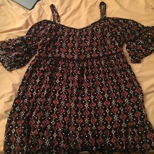 Red, Black, and cream color designed dress